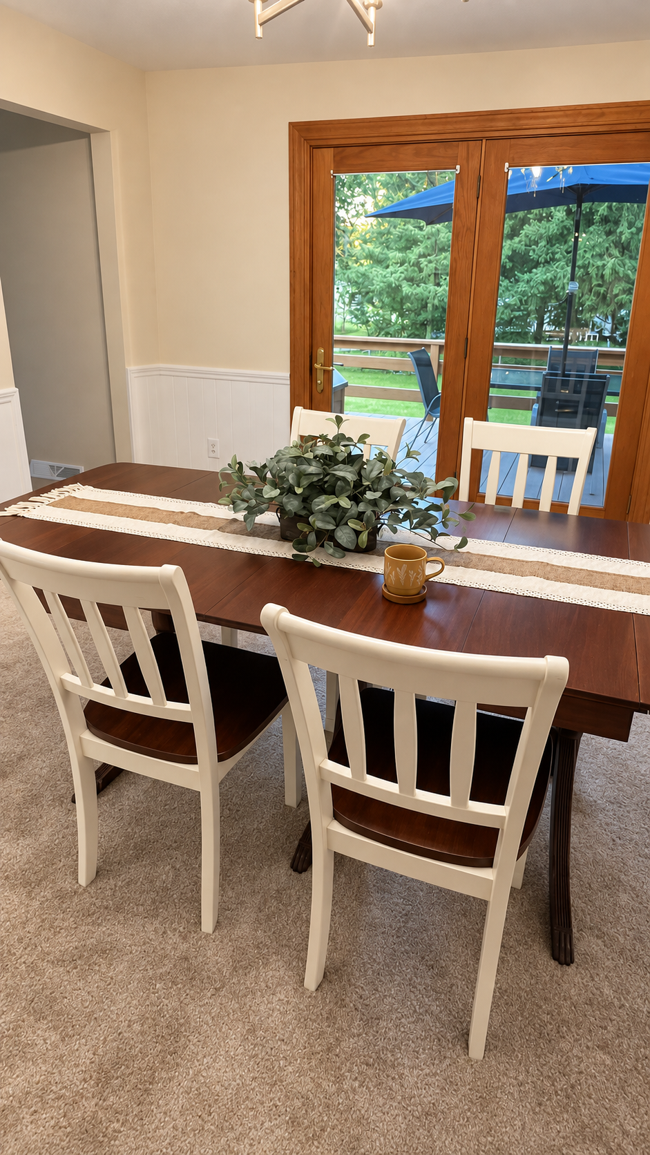 Welcoming dining room with a view of the deck